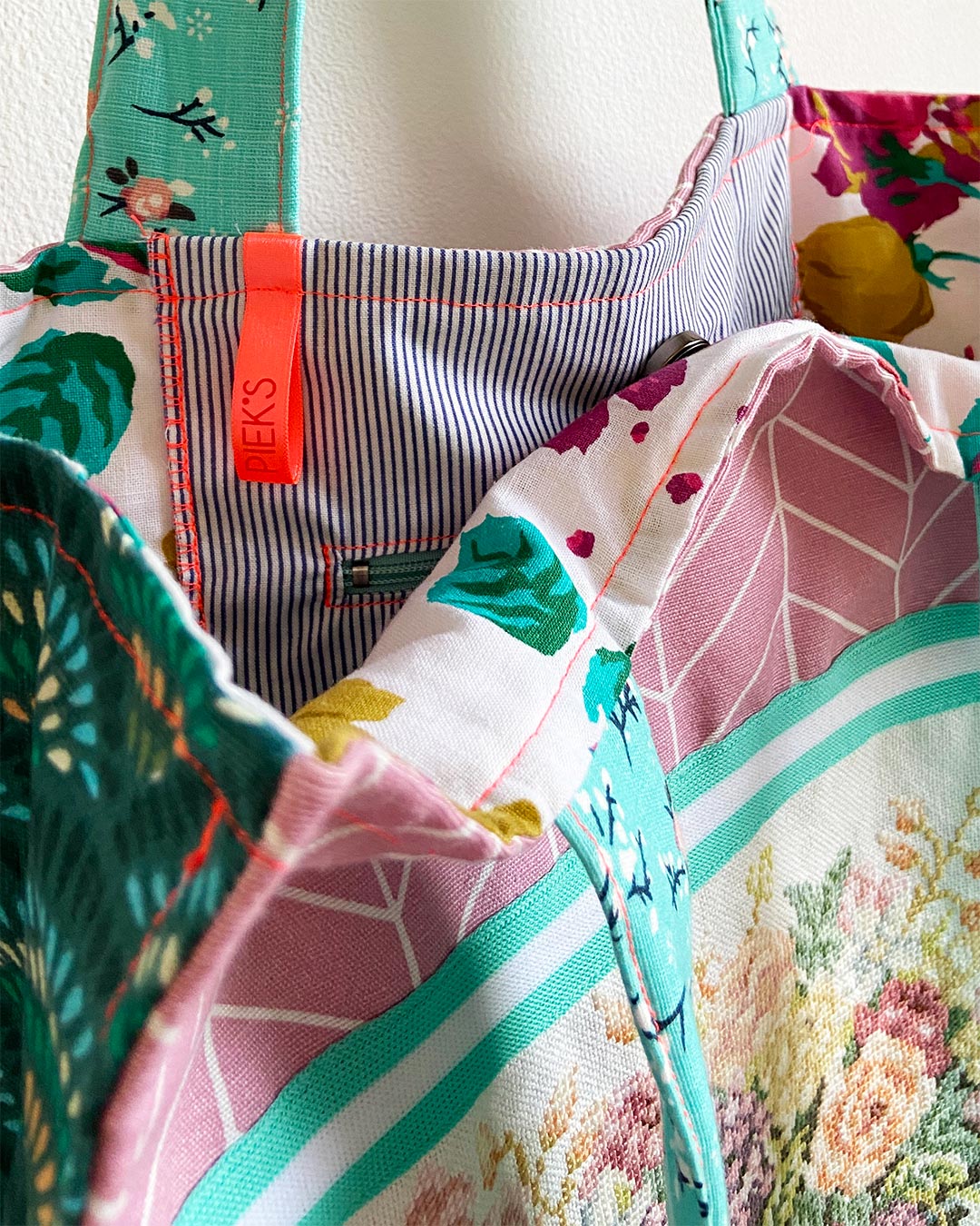 unieke, handgemaakte en stevige boodschappentas van PIEKS creations met geborduurd stilleven in pastelkleuren - magneetsluiting