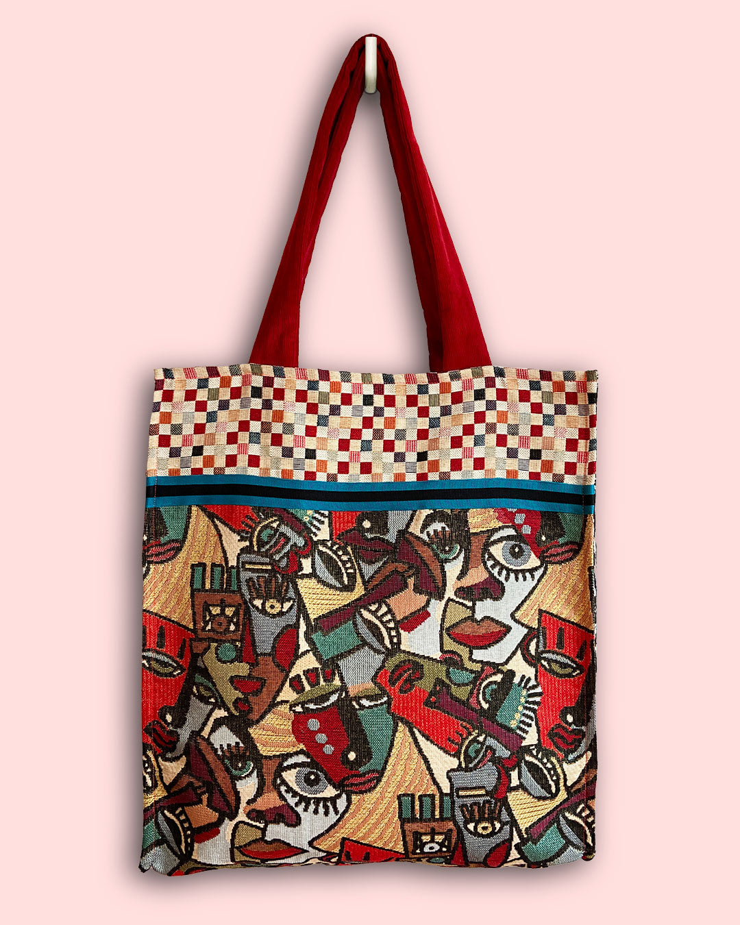 unieke, handgemaakte en stevige boodschappentas van PIEKS creations met grafisch print van gezichten - voorkant