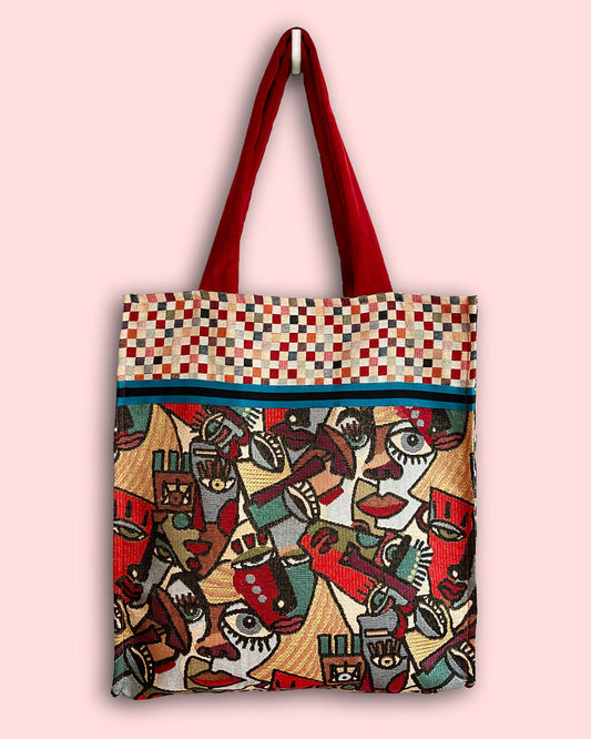 unieke, handgemaakte en stevige boodschappentas van PIEKS creations met grafisch print van gezichten - voorkant